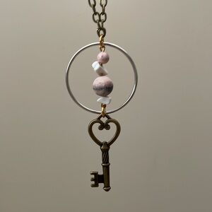 Mixed metal gemstone hoop key necklace